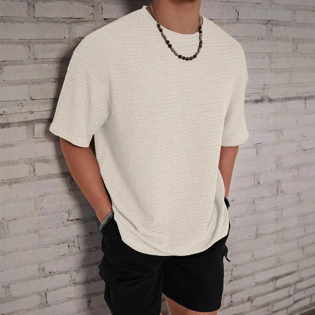 Men's slim-fit loose hollow polyester t-shirt in light blue colour.