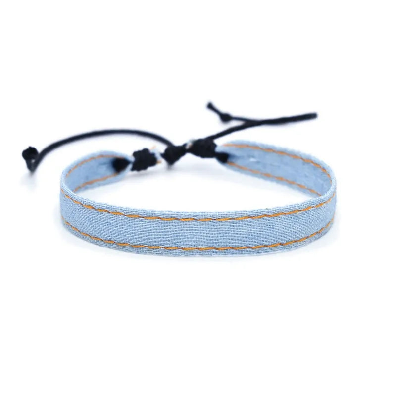 Handmade denim fabric bracelet strap for travel memories, shown in one of eleven colour variants