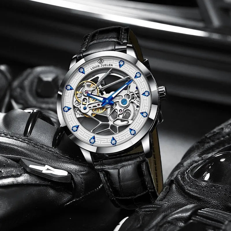 Men's silver case mechanical watch with white dial, blue luminous hands, and black leather strap.