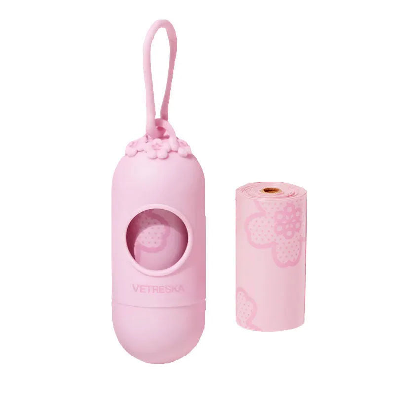Portable dog poo bag dispenser capsule with scented inner bags in strawberry, orange or cherry blossom options