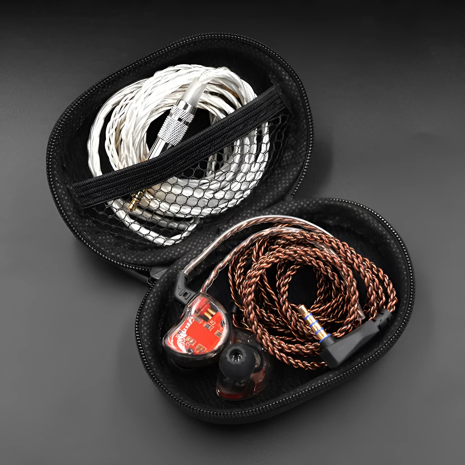 Black oval leather earphone storage bag for EDX PRO and ZEX PRO audio devices