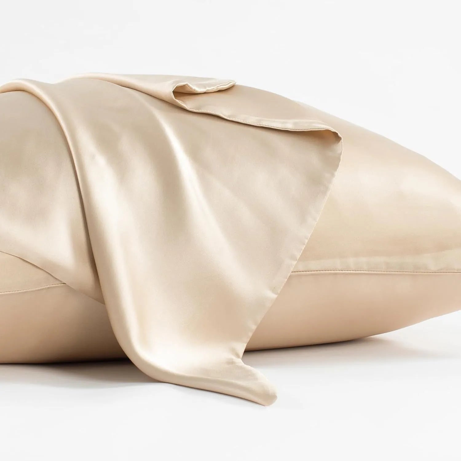Dark grey silk pillowcase with envelope closure, shown flat and on a pillow.