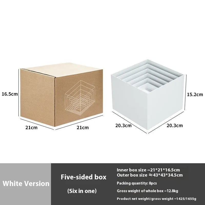 Six white plastic cube dessert display stands in graduated sizes from 3 to 8 centimetres.