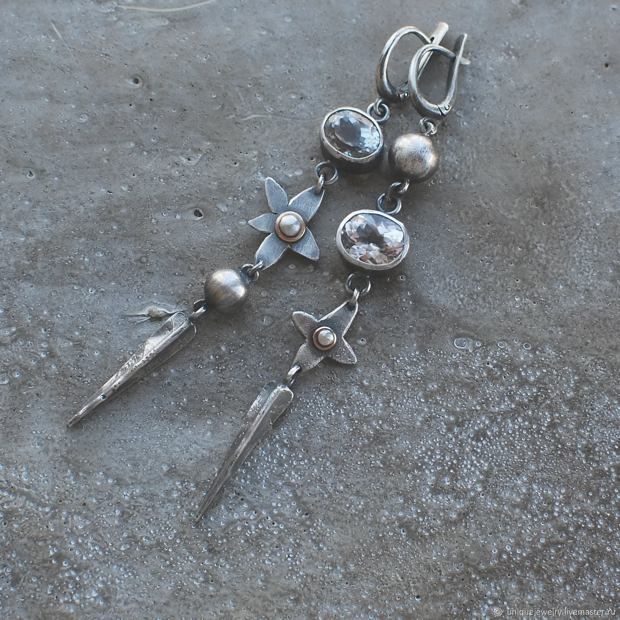 Pair of Hesheng geometric long drop earrings with antique silver XINGX pendant and rhinestones.
