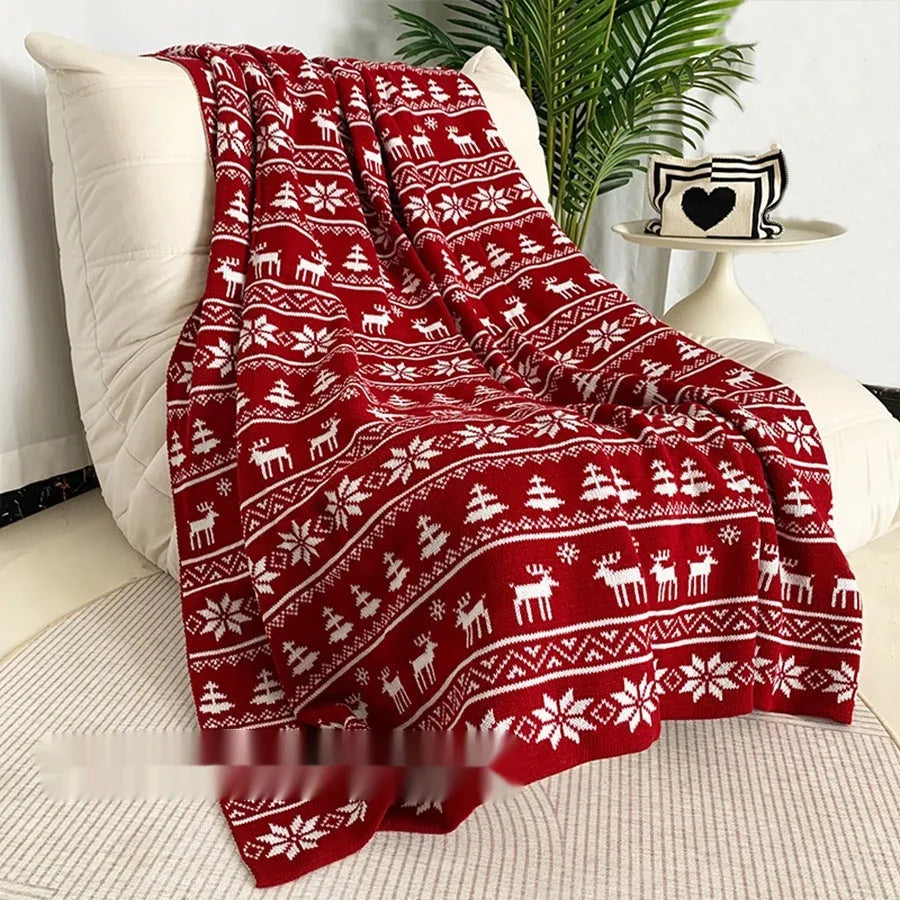 Personalised Christmas blanket with festive snowflake or reindeer pattern in acrylic fabric