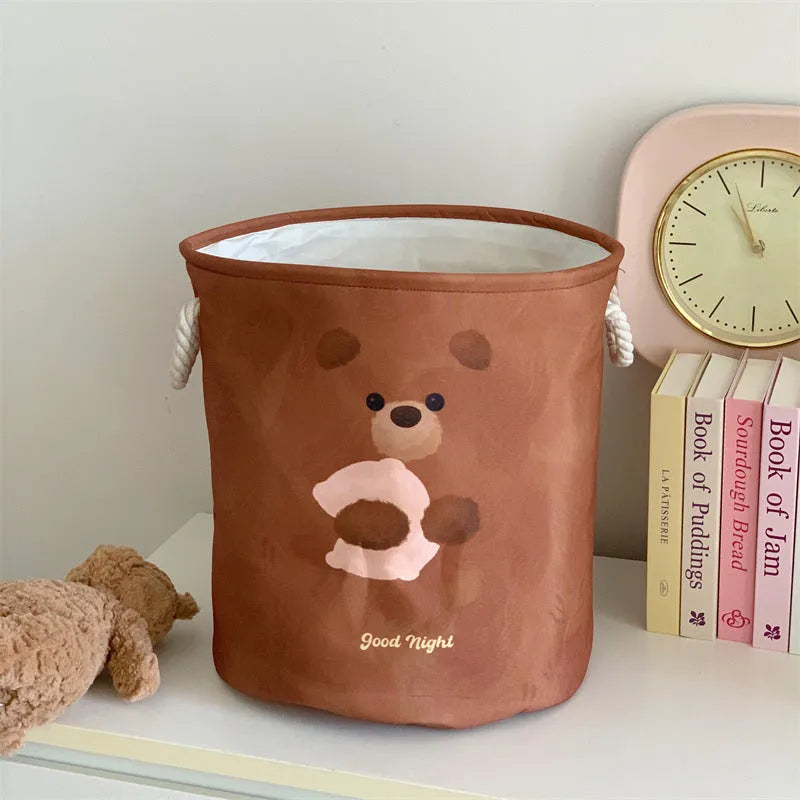Foldable cotton laundry basket in mint green colour with bear design pattern for bedroom storage