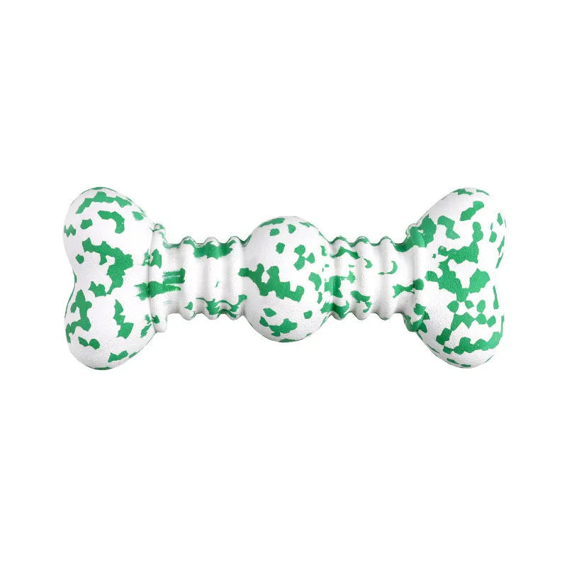 Green, white, and yellow camouflage pattern natural rubber bone chew toy for large breed dogs on a plain background.
