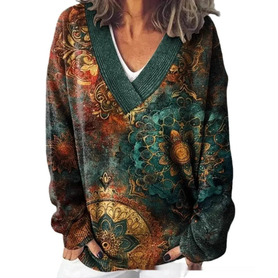 Women's V-neck floral print sweatshirt with long sleeves in wool woven fabric.