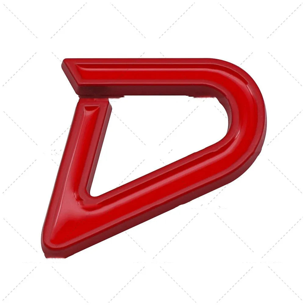 Red and silver SD-shaped metal decorative sticker for cars next to smaller red and black D-shaped sticker.