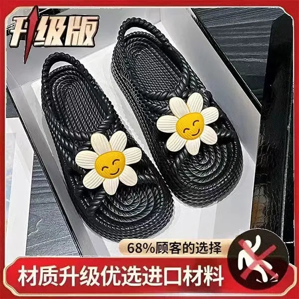 Women's floral decorated PVC sandals in beige or black with non-slip soles