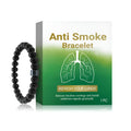 Men's bracelet made of glass and black gallstone beads on a wrist.