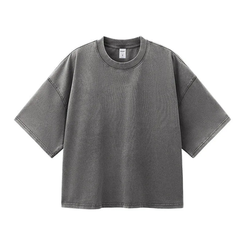 Men's vintage cotton t-shirt with washed-out treatment in khaki light colour showing loose fit and drop-shoulder sleeves