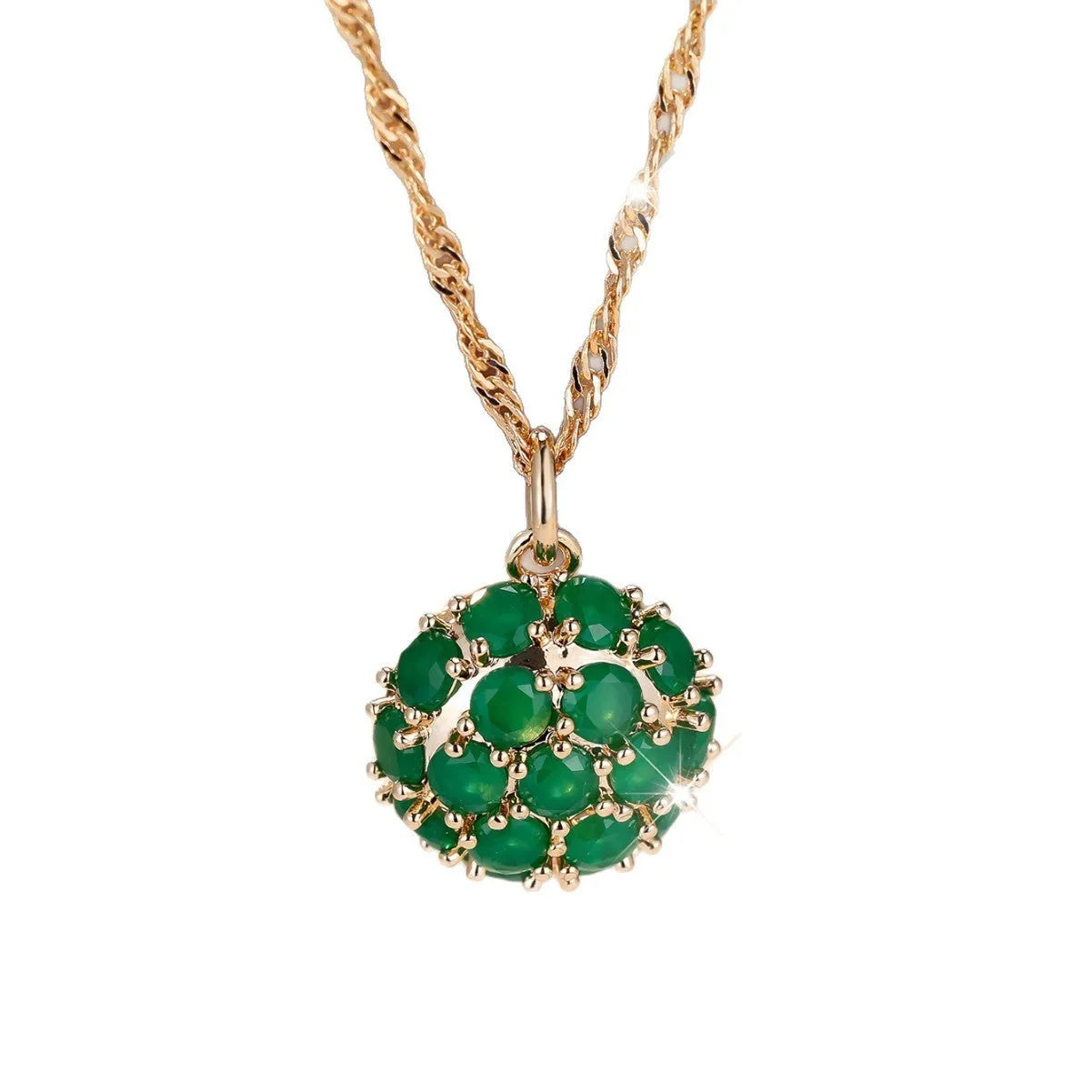Women's champagne gold necklace with round emerald pendant and diamond accents on copper chain