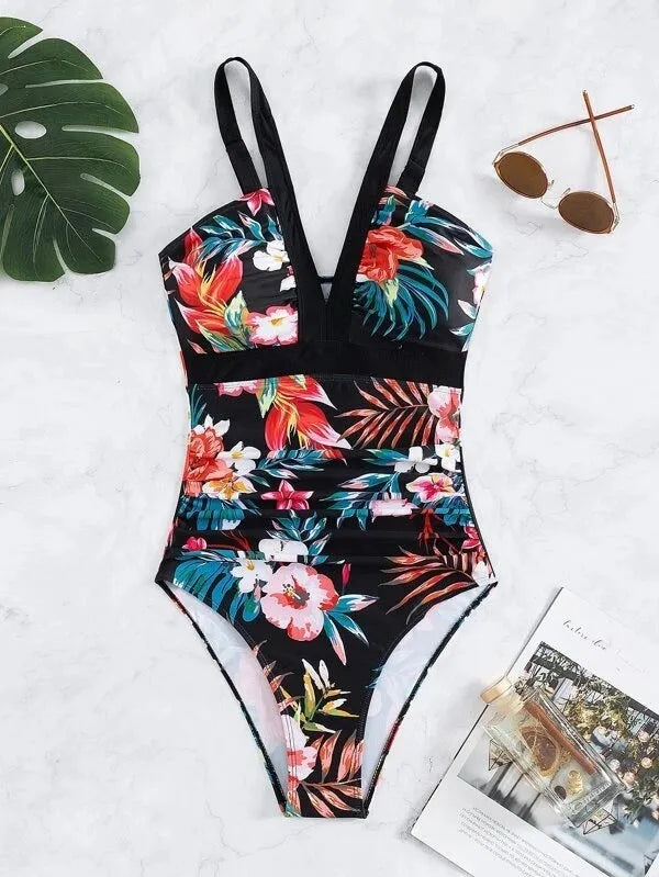 Backless floral one-piece swimsuit for women in a high-stretch polyester-spandex fabric.