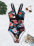 Backless floral one-piece swimsuit for women in a high-stretch polyester-spandex fabric.