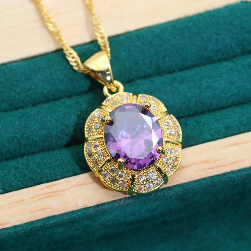18k gold plated jewellery set with multi-colour cubic zirconia stones including necklace, earrings, ring, and bracelet.
