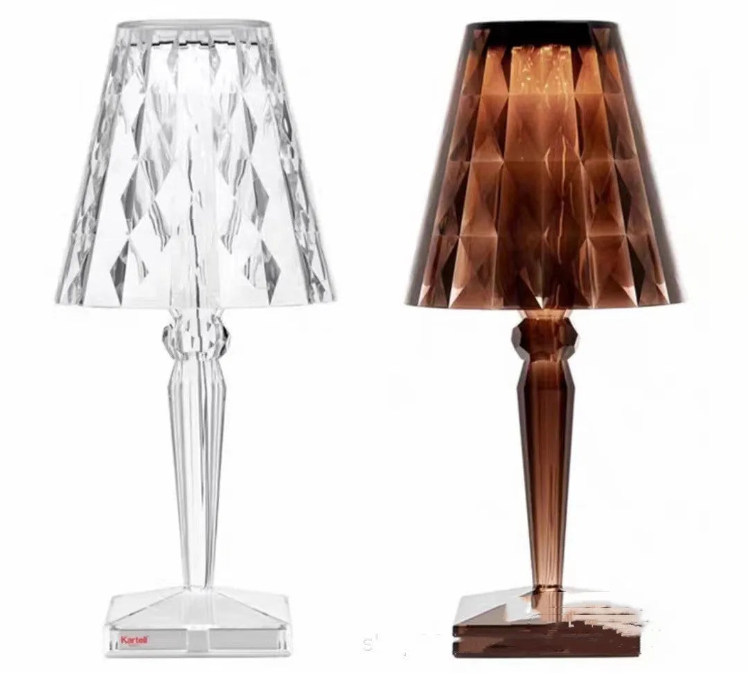 Rose gold portable touch night light with dimmable colours on a table.
