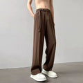 Thin straight black wide leg loose trousers laid flat, showing non-ironing casual style.