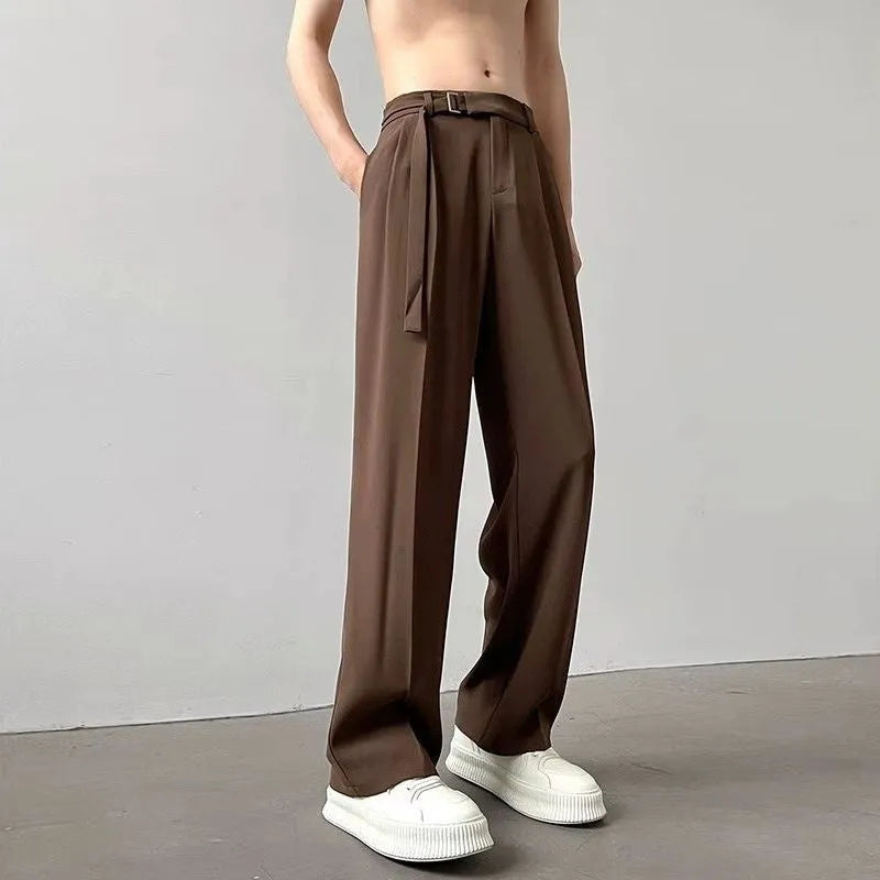 Thin straight black wide leg loose trousers laid flat, showing non-ironing casual style.
