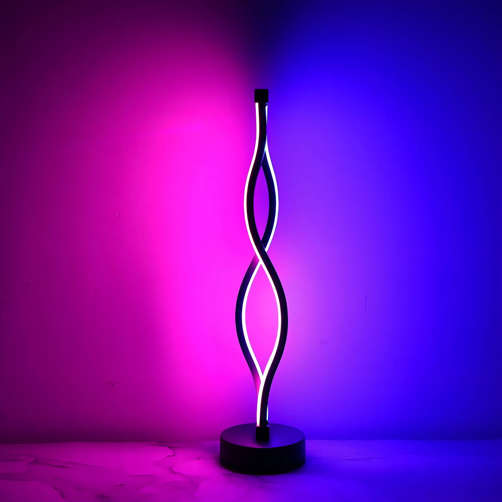 Black aluminium desk lamp with three-colour dimming button and touch controls on desktop