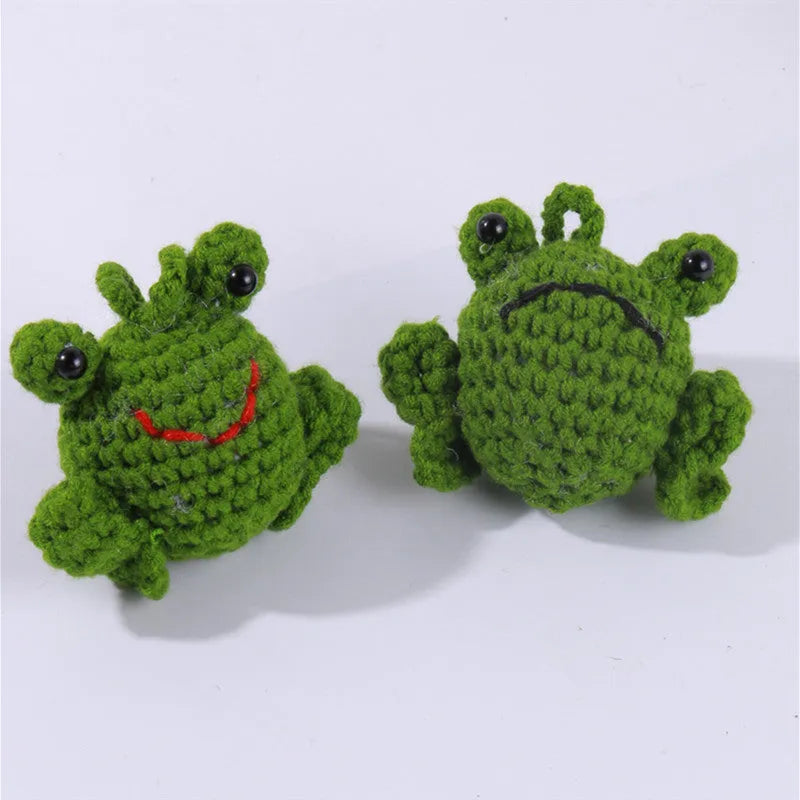 Handmade woven plush frog car pendant measuring 5cm wide by 5cm high by 15cm long