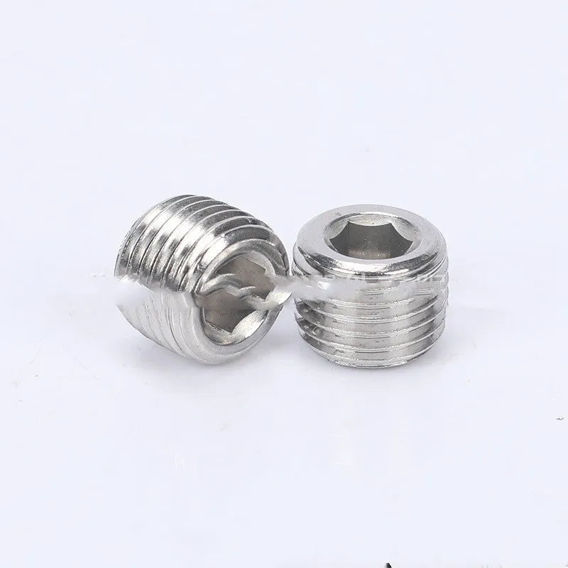 Stainless steel hexagonal plug with brass washer for 3/8 inch BSPP thread bulkhead fitting.
