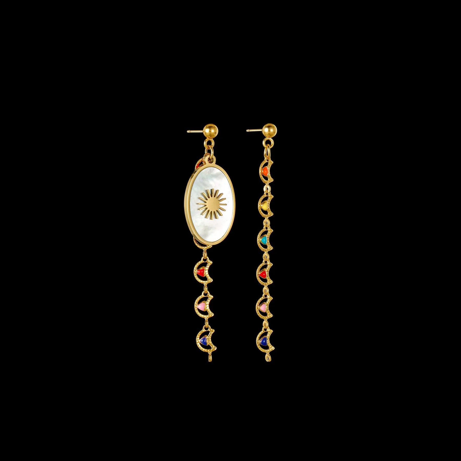 Stainless steel geometric drop earrings showing eight-awn star, eye, and shell sun designs in silver tone
