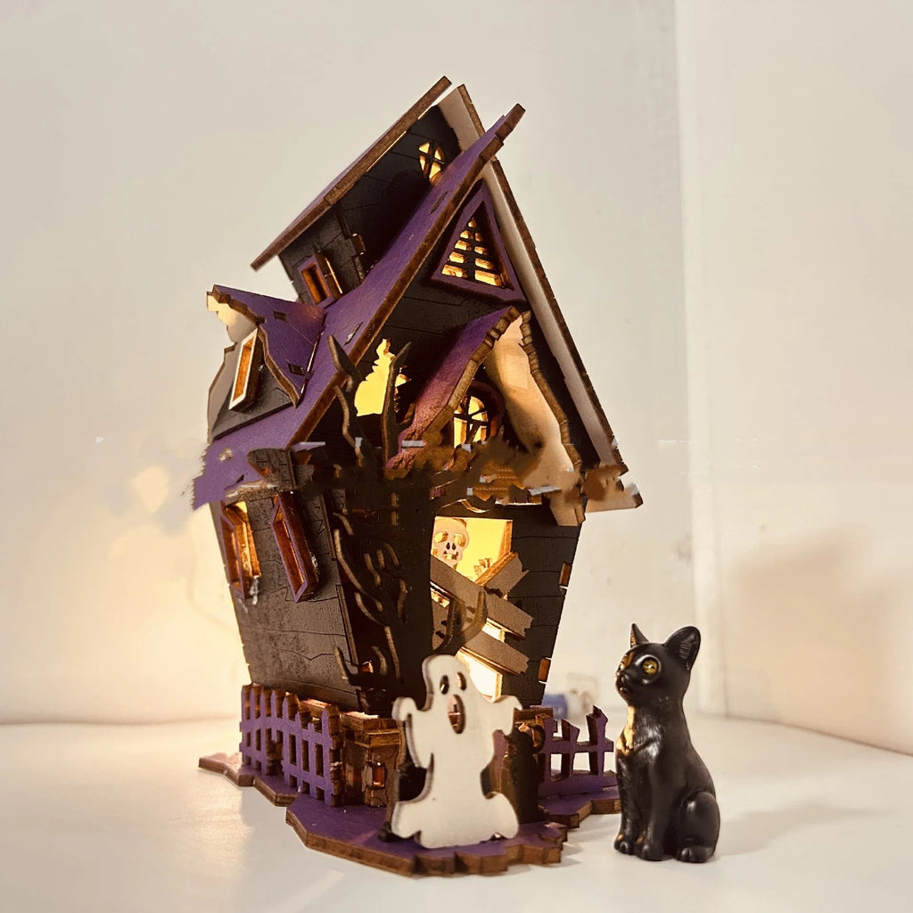 Wooden Halloween haunted house table decoration with luminous finish measuring 14x10.5x19cm
