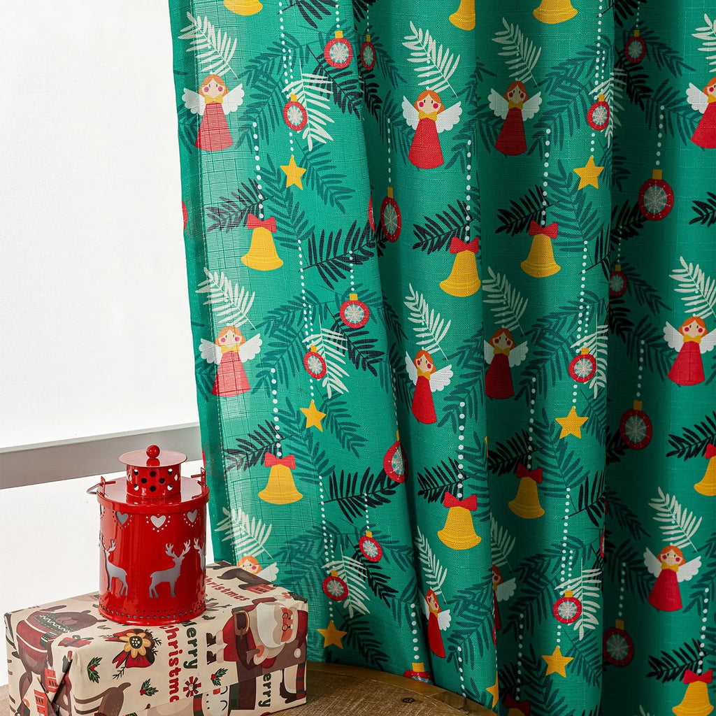 Green printed Christmas curtain with cartoon snowman and angel figures pattern