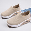Women's casual running shoes with mesh and PU upper in light gray, showing round toe and mid heel.