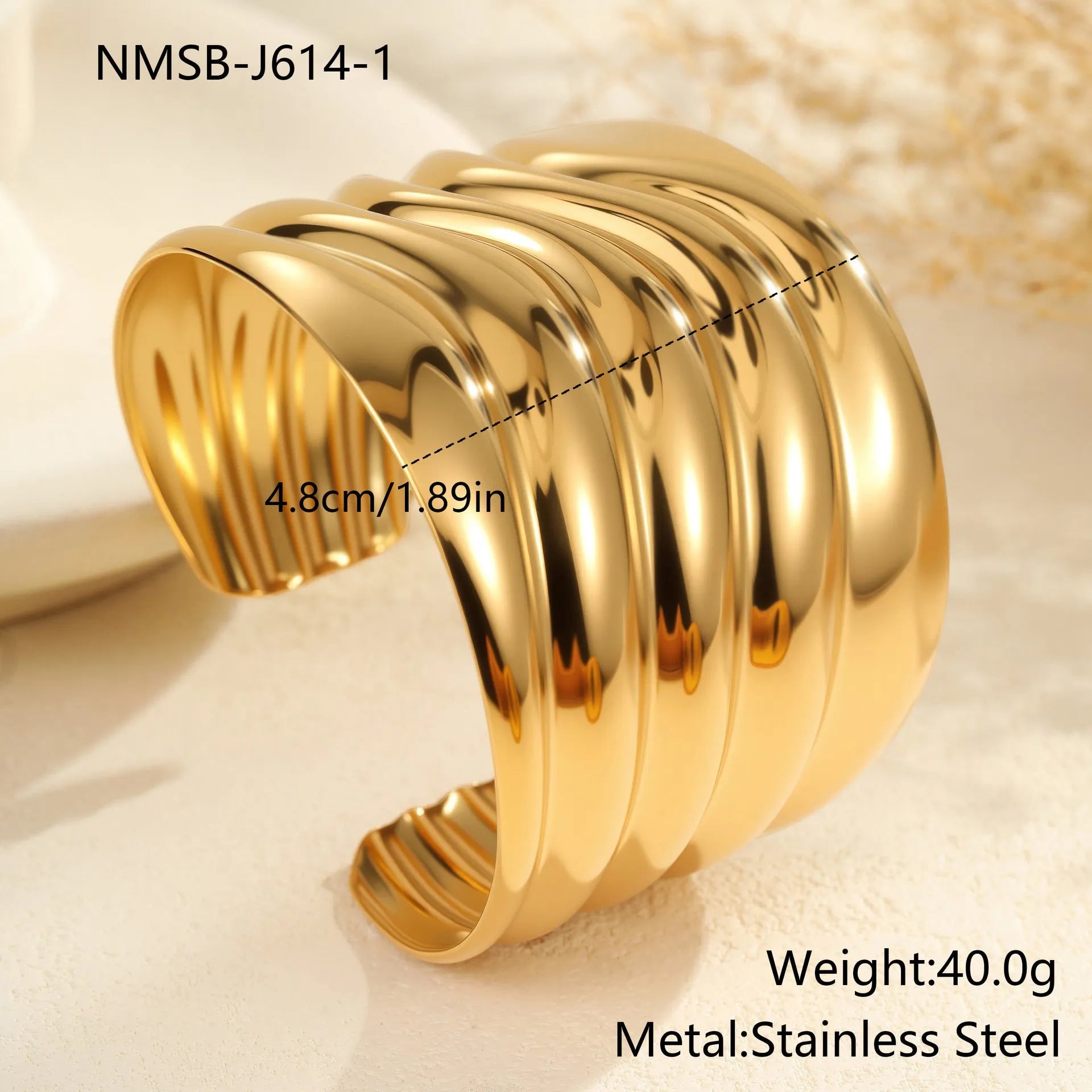 Women's 18K gold plated stainless steel bracelet with exaggerated wide wave geometric design
