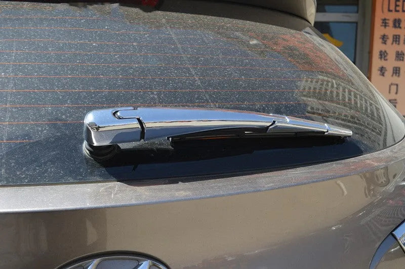 Set of four silvery ABS plastic rear wiper cover trims for a 2010 Hyundai.