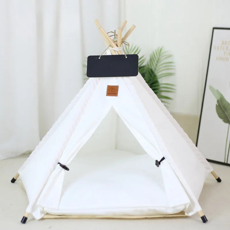 White flax and linen pet teepee tent with striped cushion inside, for small dogs or cats.