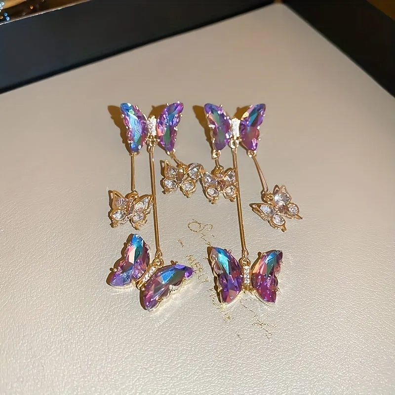 Silver needle crystal flowers butterfly tassel earrings with blue purple electroplated finish