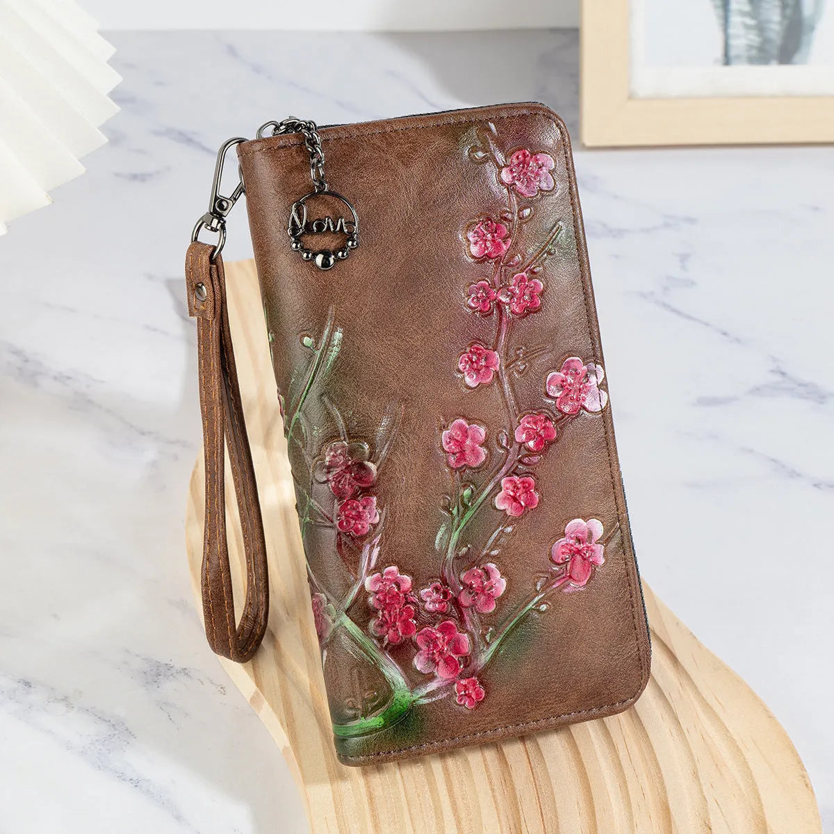Embossed hand-painted Chinese floral pattern handbag with zipper closure in black colour option
