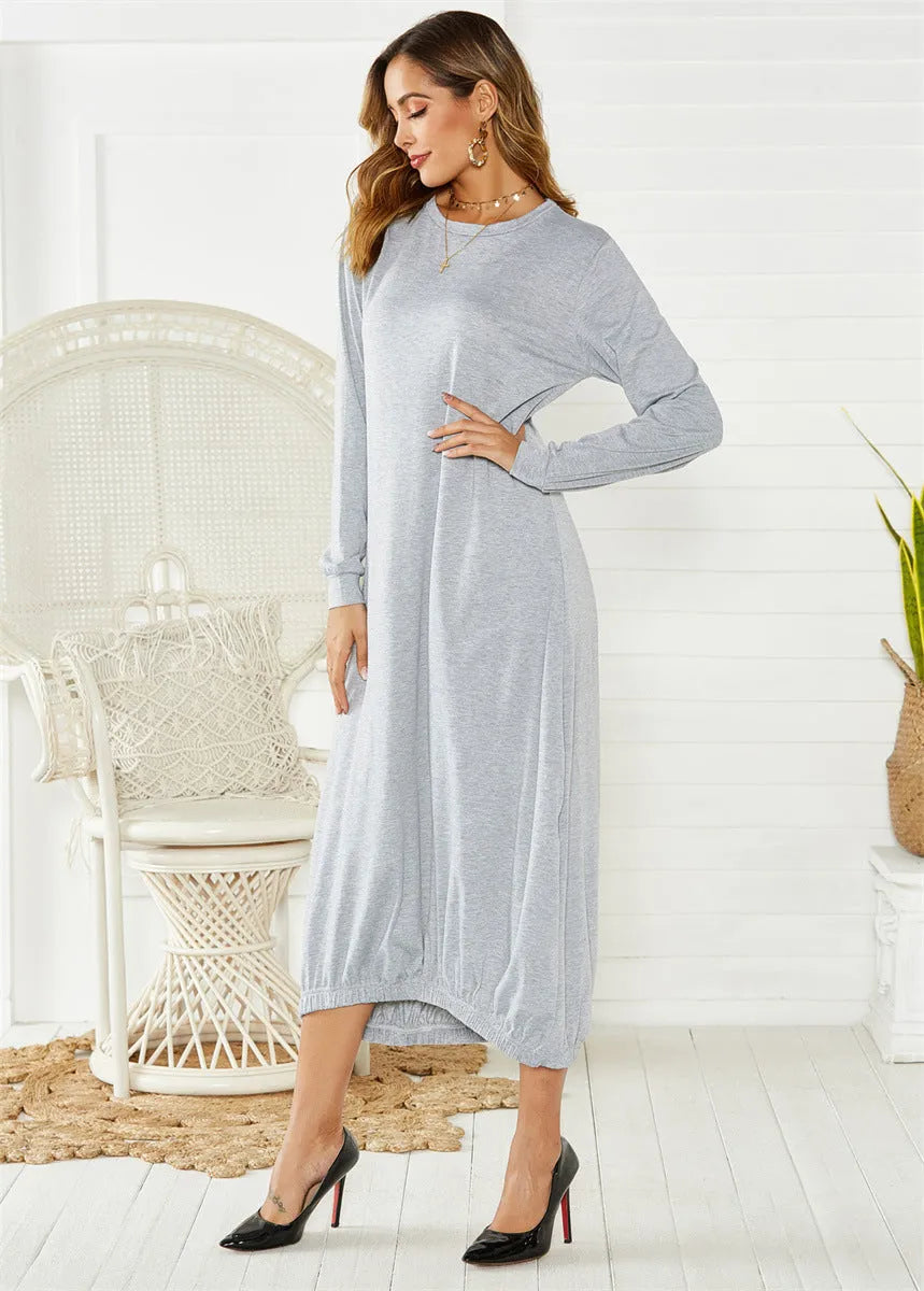 Black loose lantern dress with lace-up crew neck and long sleeves on mannequin