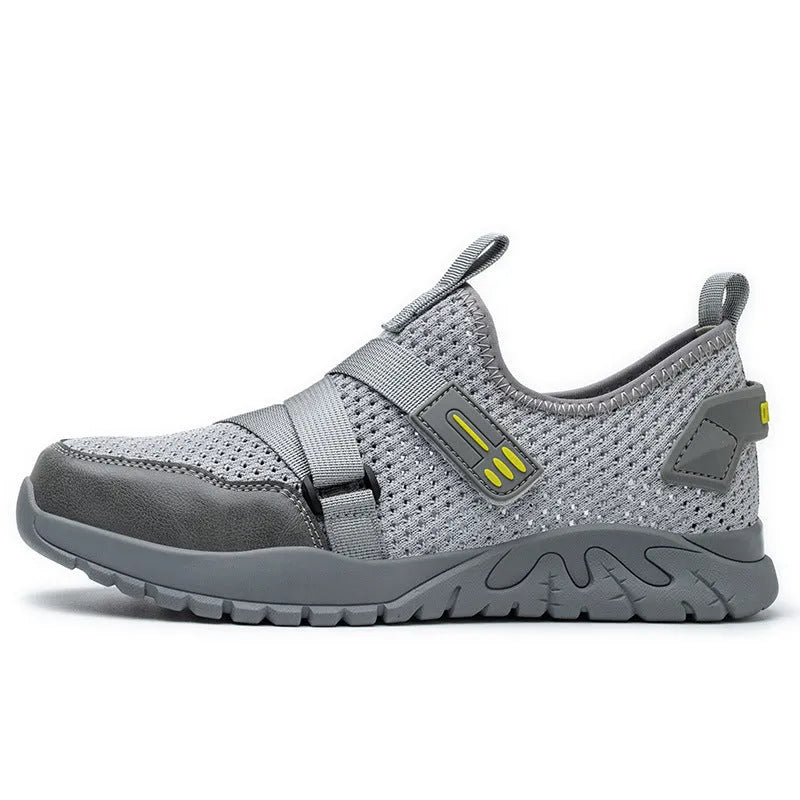Men's grey steel toe cap safety boots with rubber soles for workplace protection