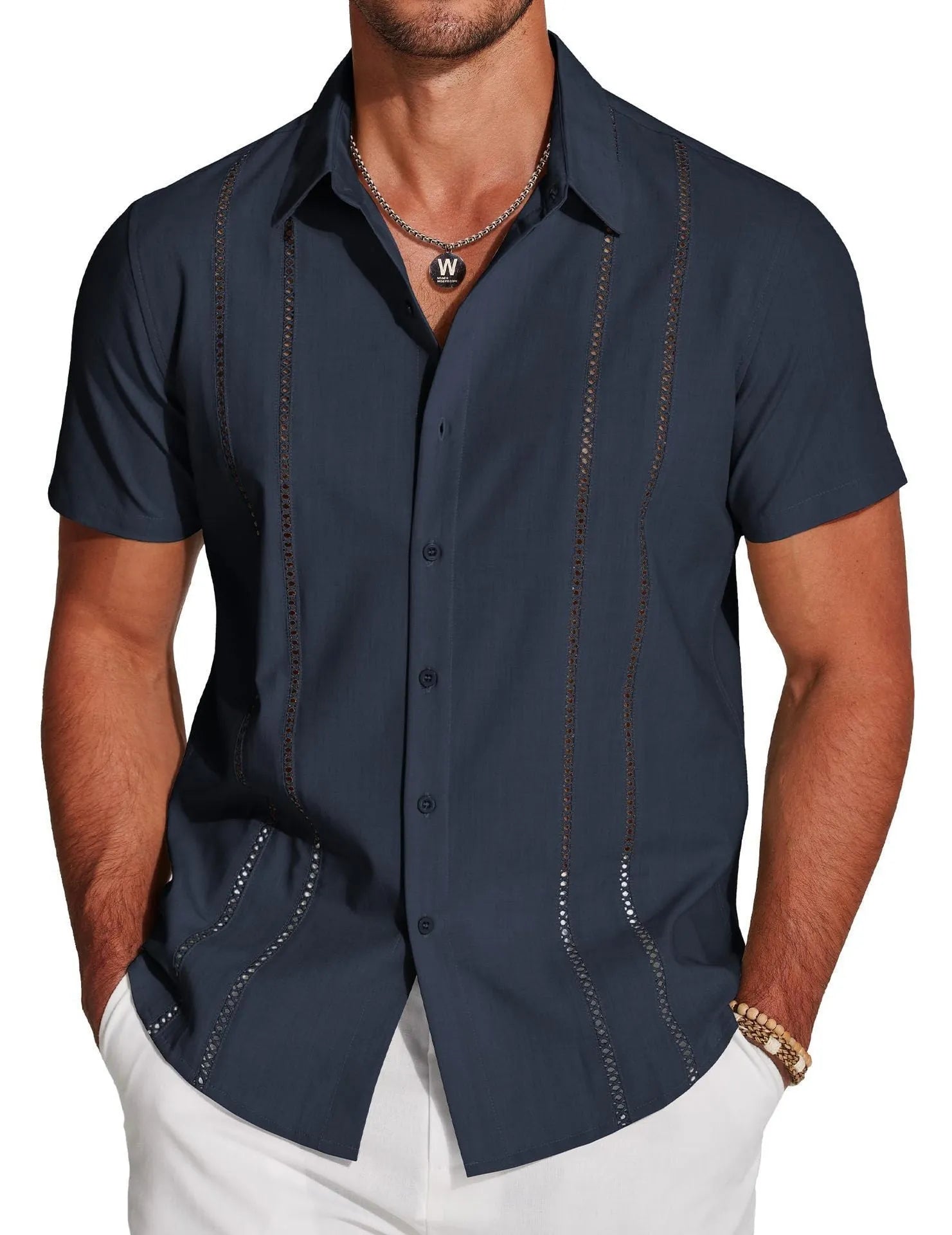 Man wearing a slim fit, short sleeve Hawaiian shirt with a colourful digital print pattern.