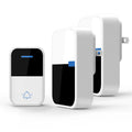 White plastic wireless doorbell system with receiver and transmitter components for long-distance home use
