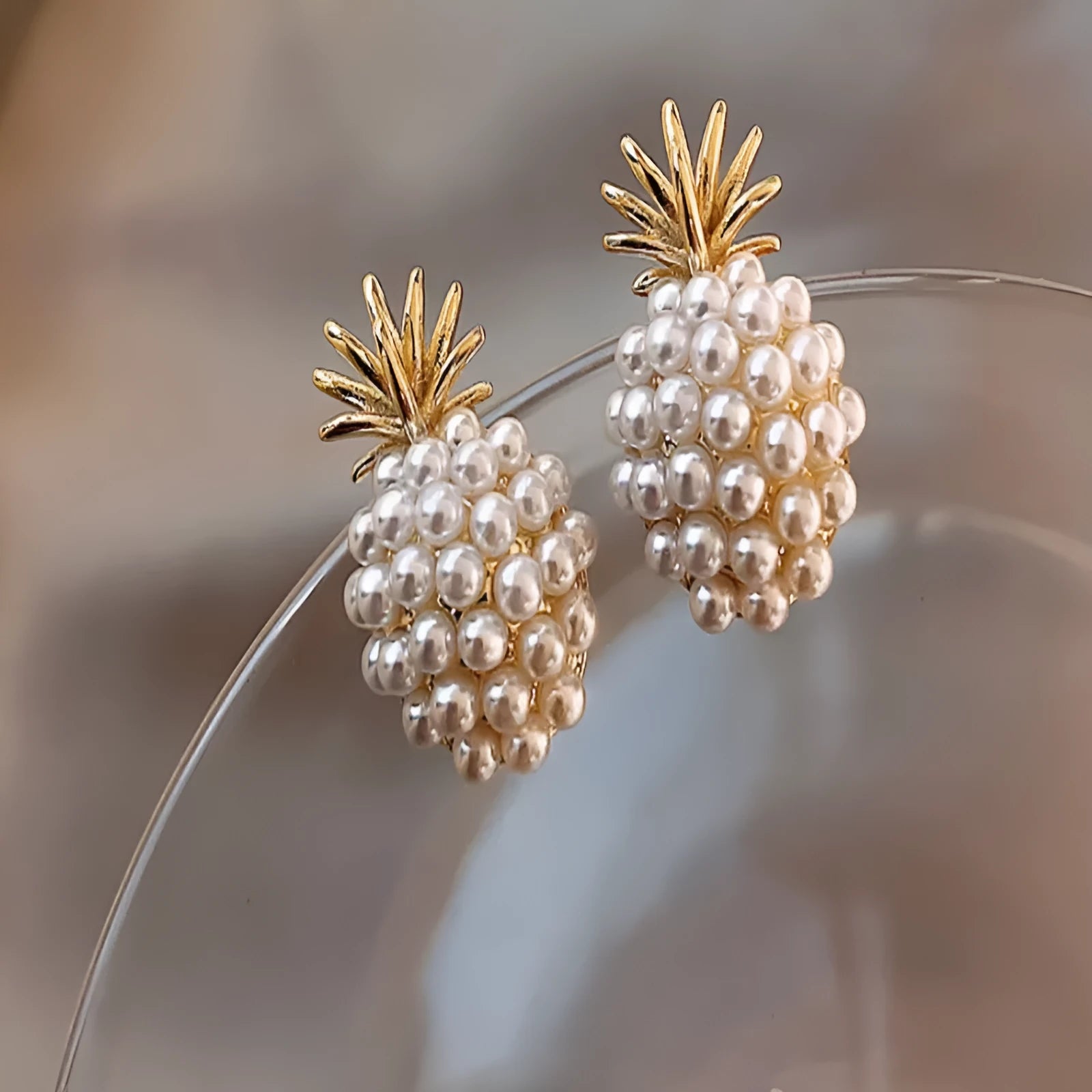 Korean-style gold pineapple starfish pearl alloy earrings with electroplated finish and gem inlay.