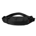 Black oxford cloth men's waist pack showing zipper opening and internal organisation pockets.