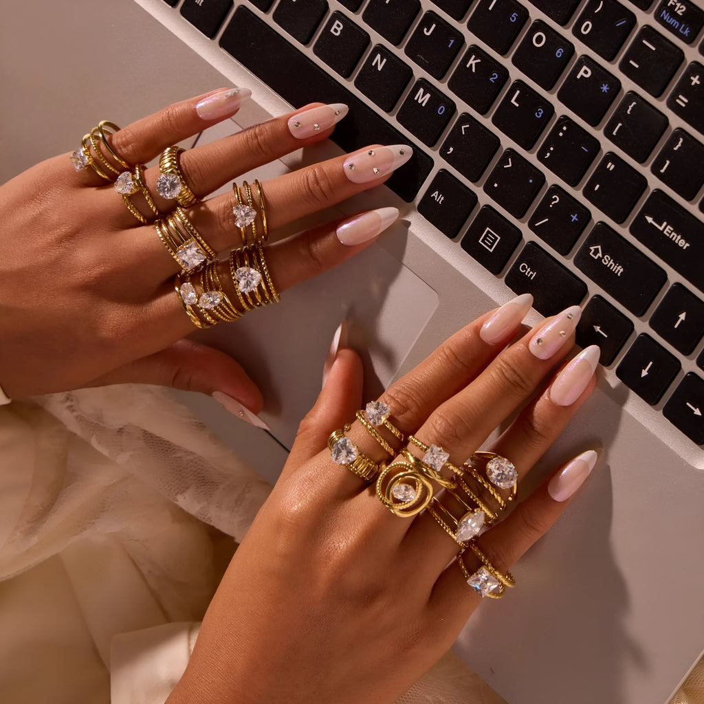Gold electroplated stainless steel ring with zircon geometric design and open mouth adjustable fit