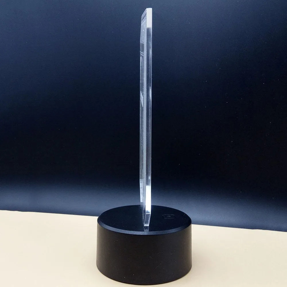 3D acrylic stereoscopic illusion LED desk lamp with remote control on a table