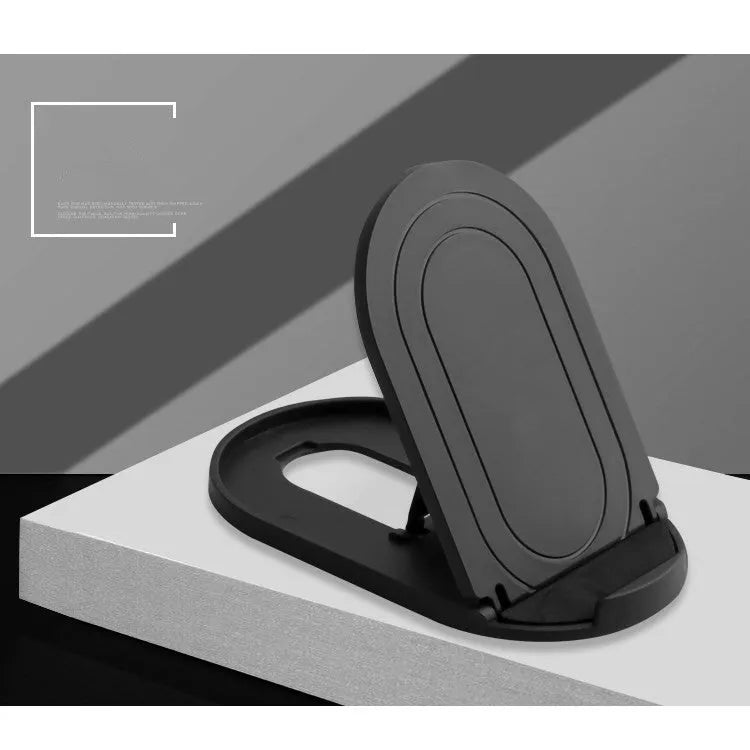 A lazy bracket style mobile phone stand made of plastic, shown in multiple colour options on a wooden desk.