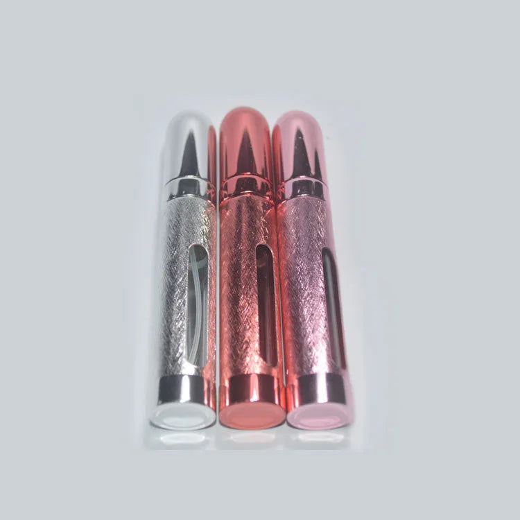 Slender 12ml aluminium portable perfume bottle with glass liner in choice of six colours.
