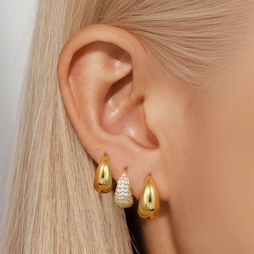 Brass diamond earclip earrings in geometric circular design with gold electroplated finish