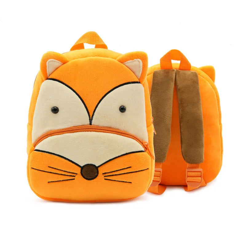 Soft plush children's backpack with cartoon animal design, showing zippered main compartment.