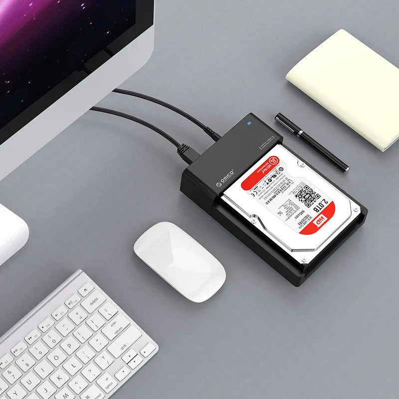 Black plastic 2.5 and 3.5 inch universal SATA hard disk enclosure with data cable