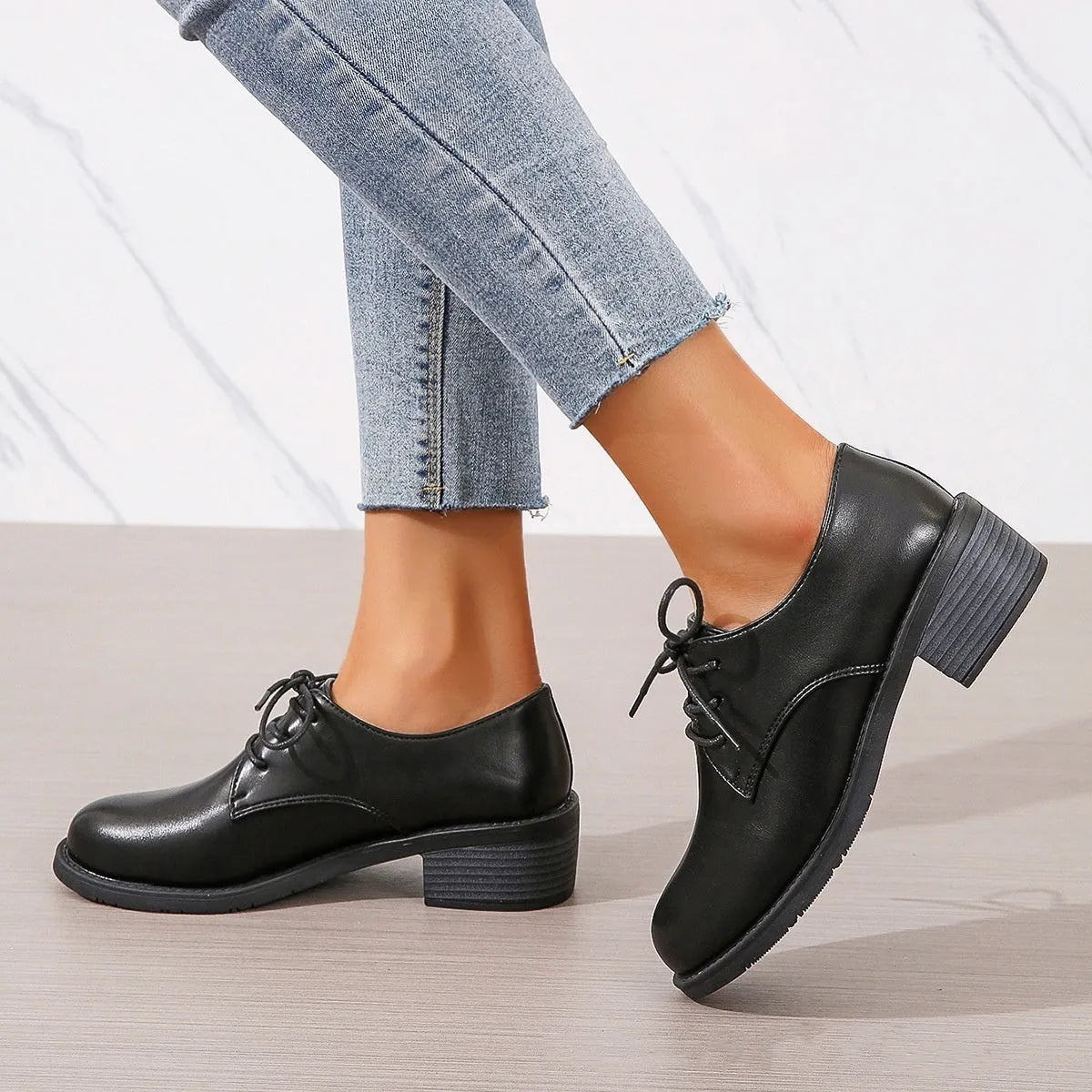 Black women's work shoes with thick chunky heel and low-top design