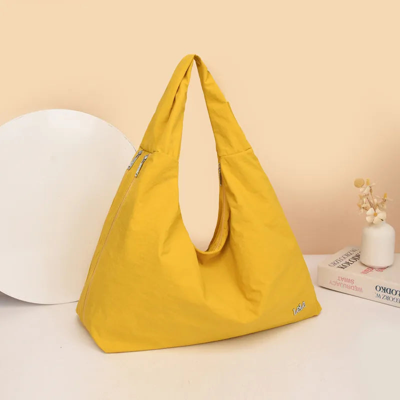 Women's heart-shaped nylon crossbody bag in black, yellow, khaki or blue colours